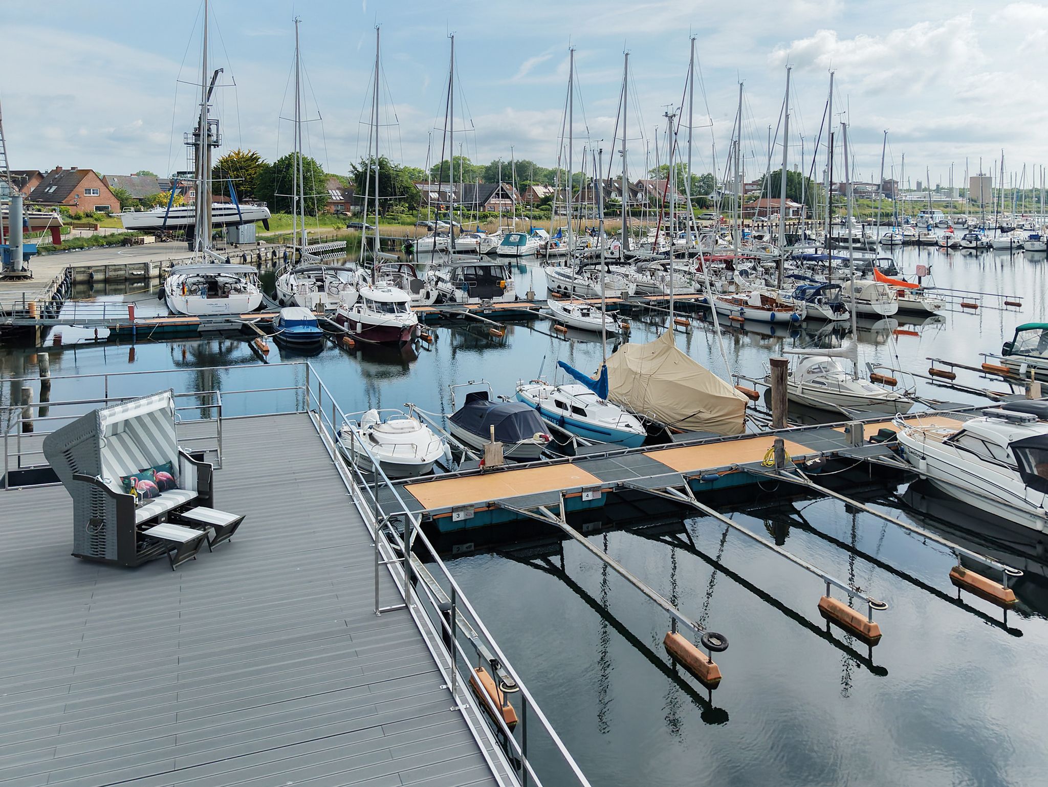 Panoramic harbor view from a new water view home by European builder